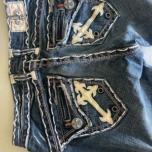 Laguna B Dark Blue Denim jeans with White Stitching & cross accent pockets.